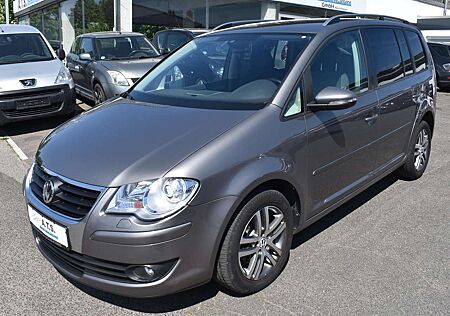 VW Touran Volkswagen Freestyle AUTOMATIK*7-SITZE*2.HAND*NAVI*SITZHZ*AHK