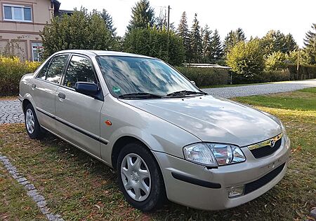 Mazda 323 S1.5L 1.Hd,Servo,Klima,wenig km. Tüv/Au Neu!!!!