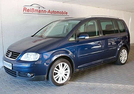 VW Touran Volkswagen 2.0 TDI Highline, Navi, Xenon, 7 Sitze