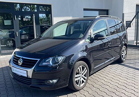 VW Touran Volkswagen Freestyle 7 Sitzer - Navi- SHZ- PDC- AHK