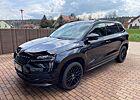 Skoda Karoq 2.0 TSI 4x4 DSG Sportline 8-fach-bereift