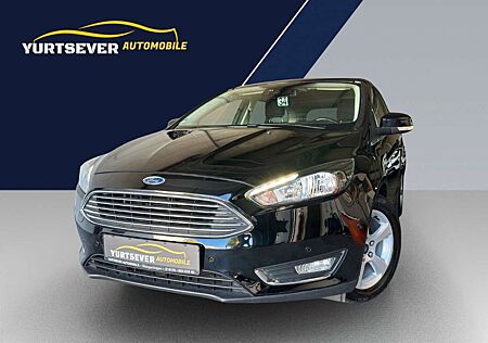 Ford Focus Turnier Titanium*PDC*NAVI*AHK*SHZ*ALU*EFH*