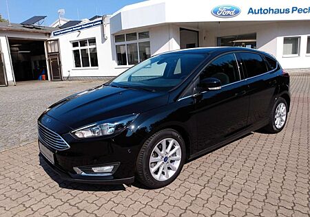 Ford Focus Titanium - 8fach*Winterpak.*RFK*Navi*Tempomat*PPS