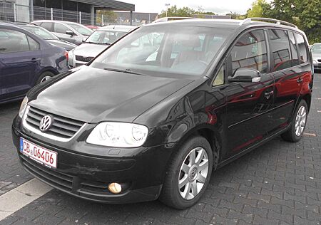 VW Touran Volkswagen 2.0TDI Highline.TEMPOMAT.NAVI.LEDER.6.GANG.ALU.AHK