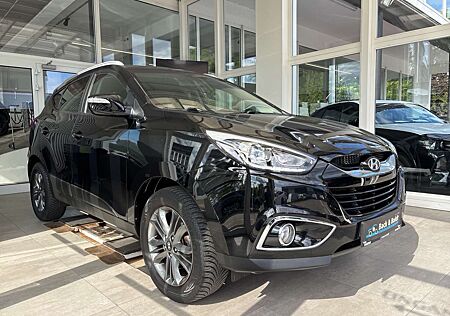 Hyundai Tucson blue Style 1.6i*NAVI,RFK,SITZHEIZUNG,EPH*