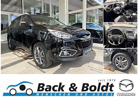 Hyundai Tucson blue Style 1.6i*NAVI,RFK,SITZHEIZUNG,EPH*