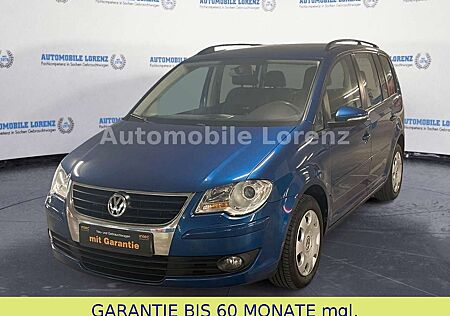 VW Touran Volkswagen / XENON / LÜCKENLOSES SCHECKHEFT
