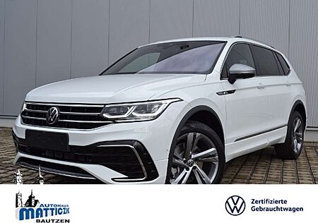 VW Tiguan Allspace Volkswagen 2.0 TSI 4M DSG R-Line 7-SITZER/AHK/PANO/STAND-HZ/