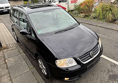 VW Touran Volkswagen 1.6 FSI Highline 7 Sitze SR+WR eGSD DSG ?