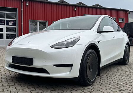 Tesla Model Y Basis RWD"1.Hand