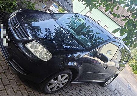 VW Touran Volkswagen 1.9 TDI Trendline, 7 Sitzer, AHK, 8 Fach bereift