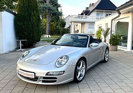 Porsche 997 Carr.S Cabr.org.68'K Navi Xen.Mem.Sitz,19"BRD