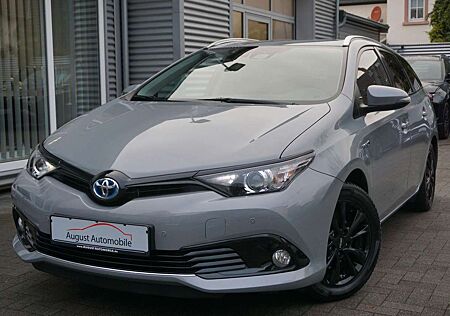 Toyota Auris Hybrid Team D Navi Alcantar
