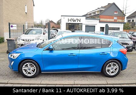 Ford Focus Lim. Cool & C* 1.HAND *NAVI *SITZH.*PDC *