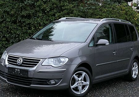 VW Touran Volkswagen Highline+7 Sitze+Navi+Standheizung+Bi-Xenon+Autom