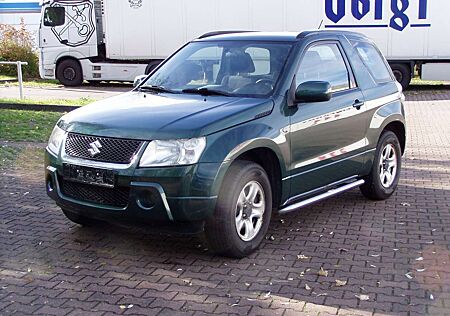 Suzuki Grand Vitara 1.6 Club # 1. Hand + Checkheft