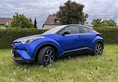 Toyota C-HR blau Vollleder schwarz AHK 8fach bereift 2.Hand