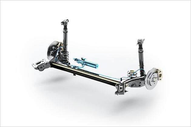 Dynamic Rolling Control gegen Wankbewegungen in der Kurve: Eine Hydraulikleitung (blau) verbindet die beiden Stoßdämpfer an der Hinterachse. Eine Art dritter Stoßdämpfer in der Mitte der Achse agiert als passives Hydrauliksystem