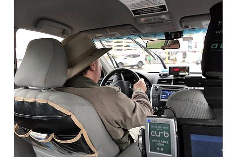 Taxifahrer John