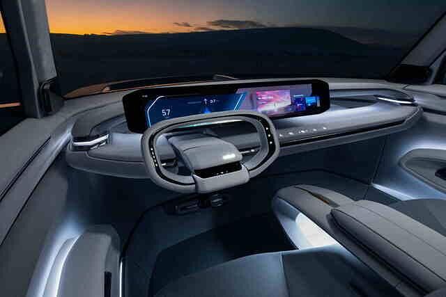 Das Cockpit mit Riesendisplay und o-förmigem Lenkrad