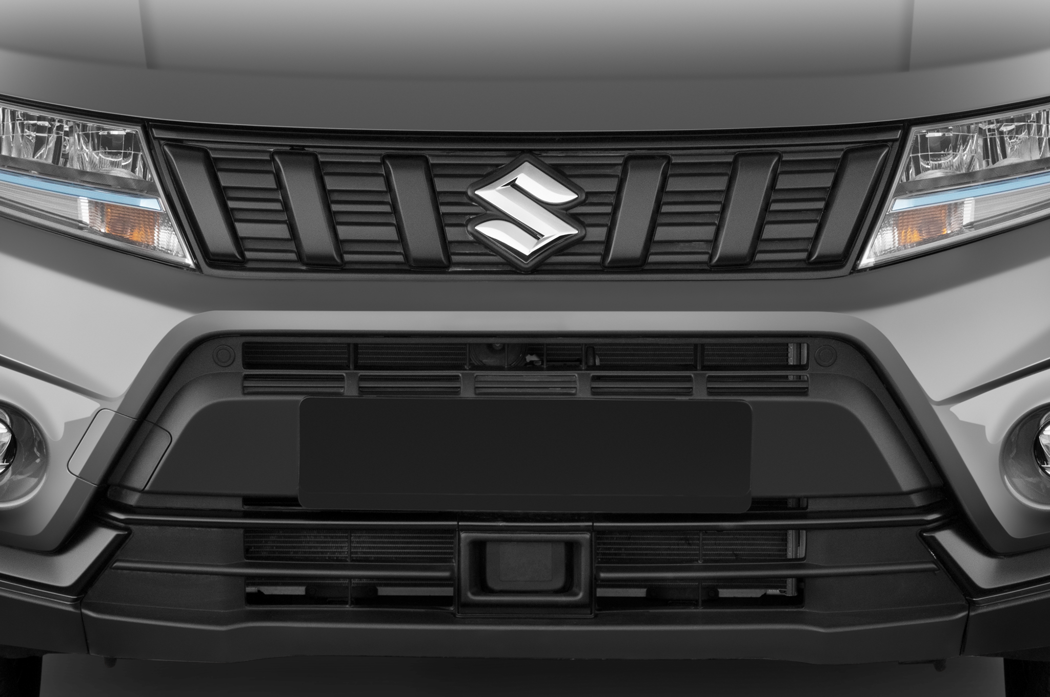 Suzuki Vitara Hybrid (Baujahr 2023) Comfort+ 5 Türen Kühlergrill und Scheinwerfer