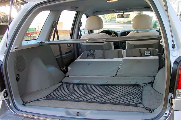 Nach dem Umlegen der Rückbank muss noch eine Querstrebe entnommen werden