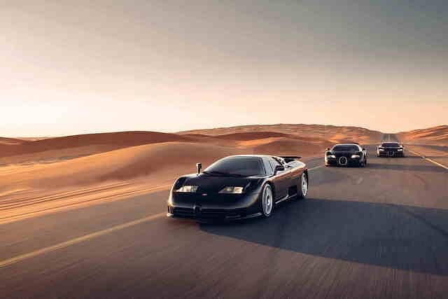 Gut 30 Jahre liegen zwischen den drei Bugatti-Generationen EB 110, Veyron und Chiron