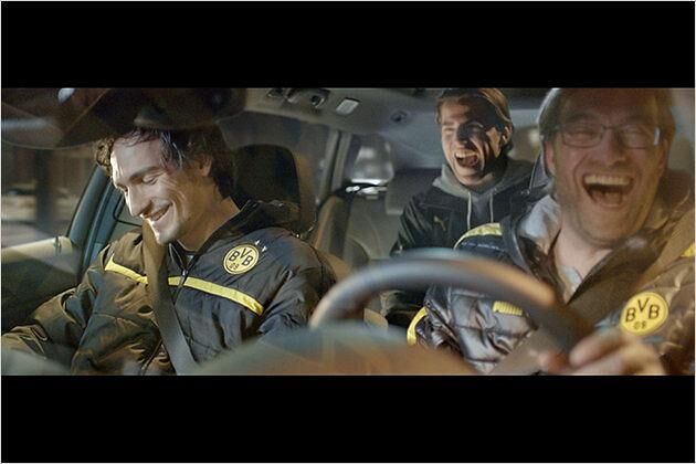 Auch Jürgen Klopp zeigt sich in TV-Spots am Opel-Steuer, in diesem Fall gemeinsam mit Mats Hummels und Roman Weidenfeller