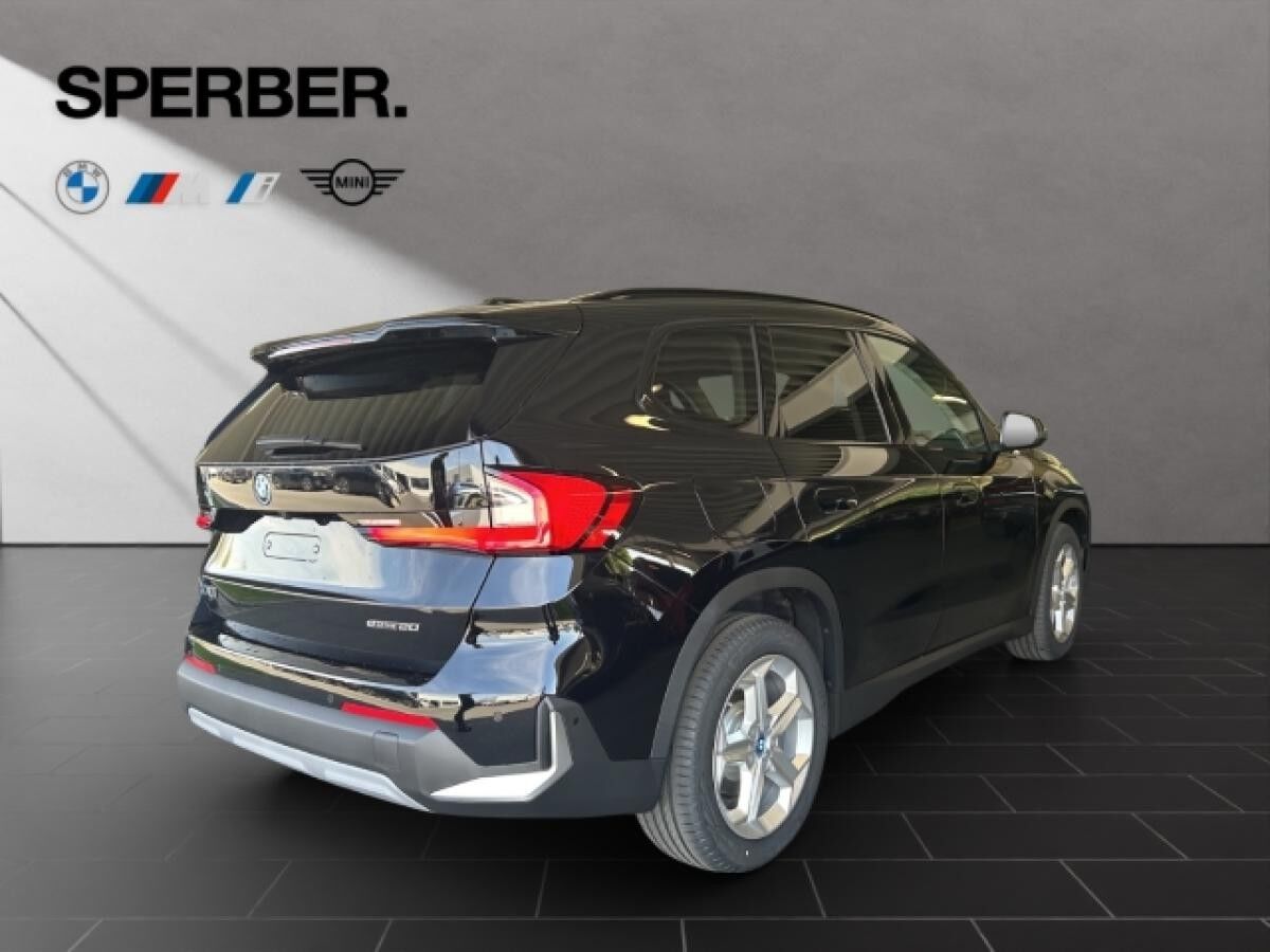 BMW iX1 eDrive20,Travel.-Pkt.,Premium-Pkt.,AHK,Lenkradhzg.,Aktivsitz,uvm.